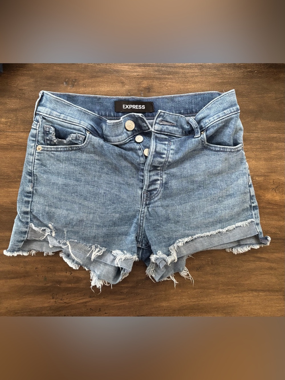 Express Women's Light Blue Distressed Denim Cutoff Shorts. Size 2